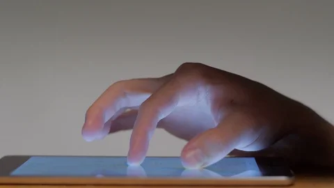Close-up male hand looking digital map making gesture approximation touching Stock Footage 101980464