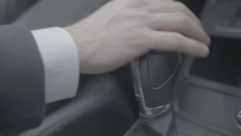 Close up of male hand moving VW gear lever Video stock 74696953