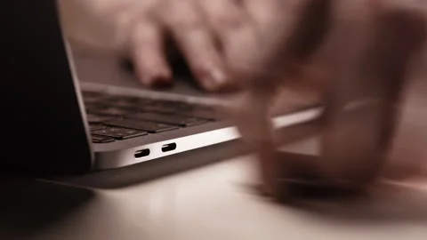 Close-up male hand unplug type-c hub with cables from laptop Stock Footage 309448761