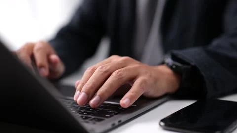 Close-up of Male hand using laptop keyboard. Vídeo Stock 166103418