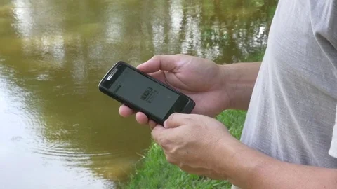 Close Up Of Male Hand Using Smartphone By Table Stock Footage 70161661