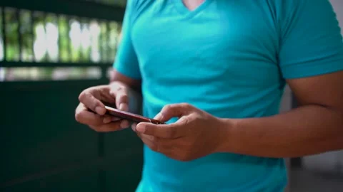 Close up of male hand using smartphone and playing mobile game. 스톡 동영상 277170773
