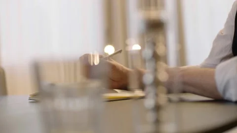 Close-up of male hands and notebook of unidentified young writer. Stock Footage 236772546