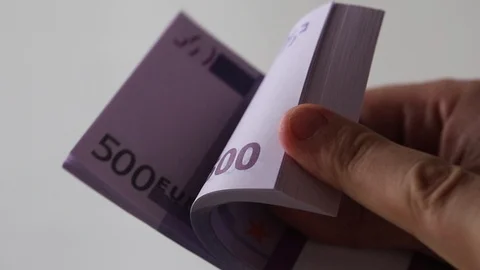 Close Up Of Male Hands checking 500 Euros Banknotes Stock Footage 125182066