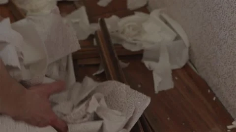 Close up of male hands cleaning up construction debris at site Stock Footage 338003249