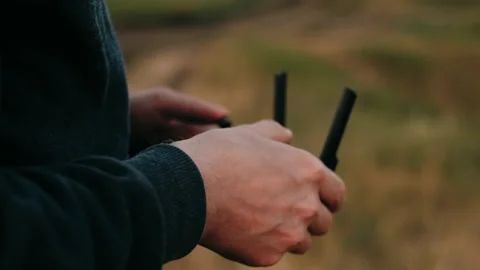 Close-up male hands control a drone. Stock Footage 133514426