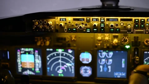 Close-up of male hands on the control panel of an airplane. Stock Footage 240326064