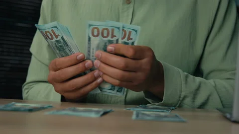 Close-up male hands counting stack dollars bills unrecognizable african american Stock Footage 234224186