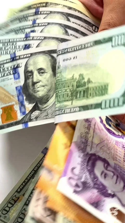 Close-up of male hands counting a stack of hundred-dollar US banknotes Stock Footage 264979838