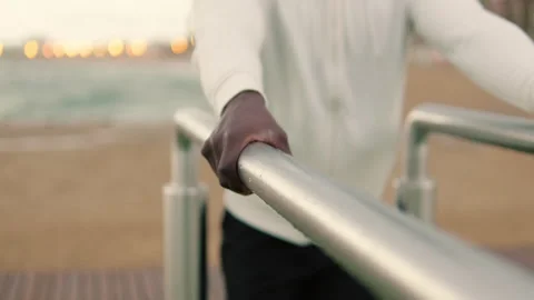 Close-up of male hands doing dips on parallel bars Stock-Footage 275259141