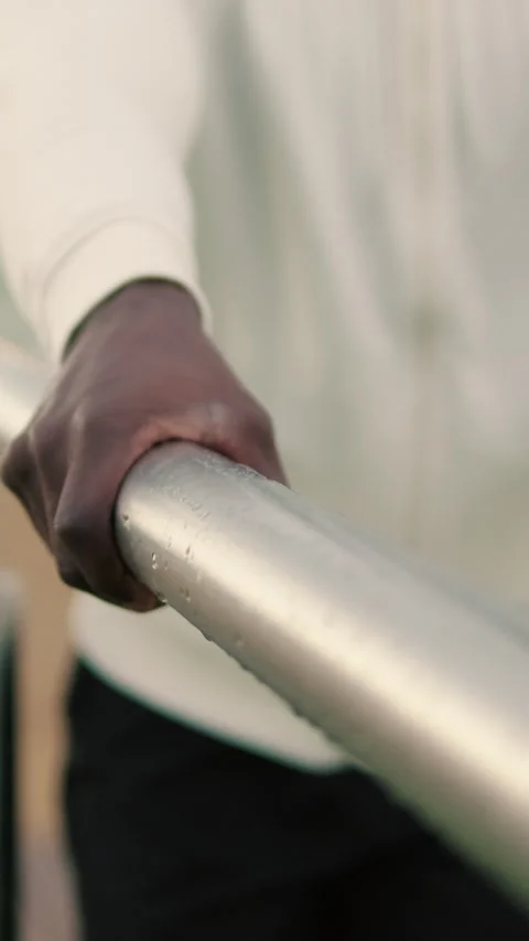 Close-up of male hands doing dips on parallel bars Stock-Footage 275259528