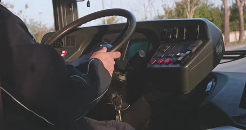 Close up of male hands. The driver is sitting at steering wheel of a bus Video stock 239726004