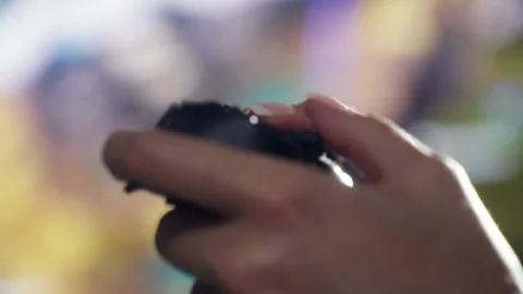 Close-up of male hands with game console playing video games, entertainment Stock Footage 334653390