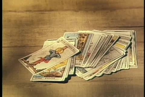 Close-up of male hands picking up deck of tarot cards Stock Footage 11366044