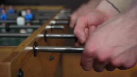 Close Up Of Male Hands Playing Table Soccer Game Miniatur Football Stock Footage 150291245
