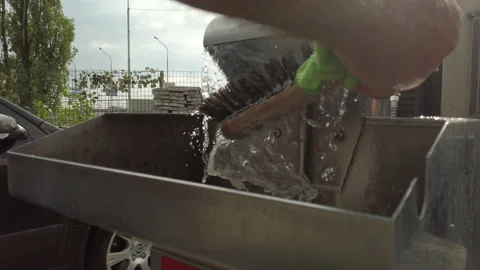 Close up male hands a rag in a machine with water 스톡 동영상 201173059