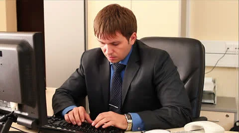 Close-up of male hands typing on computer keyboard Stock Footage 24858252