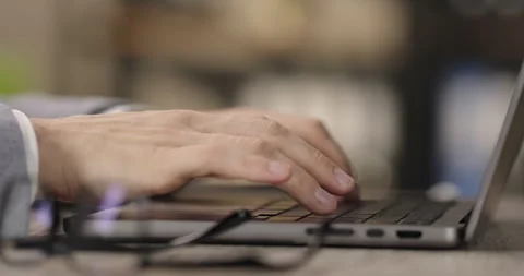 Close-up male hands typing email on laptop keyboard, working, internet browsing Stock Footage 275963452