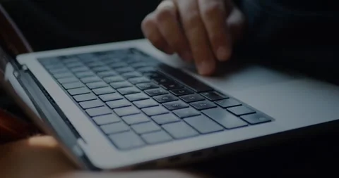 Close-Up Of Male Hands Typing or Working On Notebook... Stock Footage 331307541
