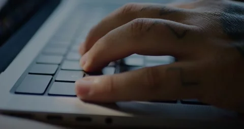 Close-Up Of Male Hands Typing or Working On Notebook... Stock Footage 331307547