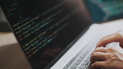 Close up of male hands typing programming on screen laptop Camera slides around 库存影片 334586668