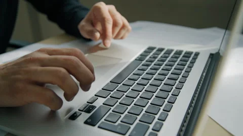 Close up of male hands typing text on laptop keyboard. Video stock 90361605