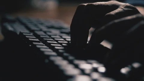 Close-up, male hands typing text on the keyboard. 4K Slow Mo Stock-Footage 105280375
