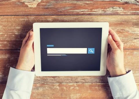 Close up of male hands using browser on tablet pc 스톡 사진