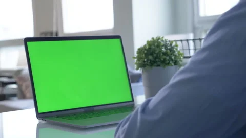 Close-up of male hands using green screen chroma key laptop typing Stock Footage 146319655