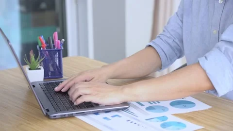 Close-up of male hands using laptop at office, Stock Footage 145532269