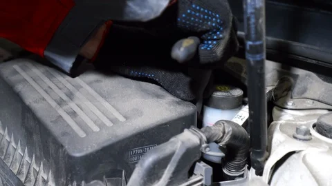 Close-up of male hands using screwdriver in car slowmotion. Footage. Stockbeeldmateriaal 127242009