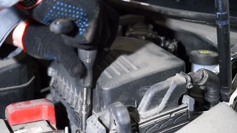 Close-up of male hands  using screwdriverin car slowmotion. Footage. 스톡 동영상 127242118