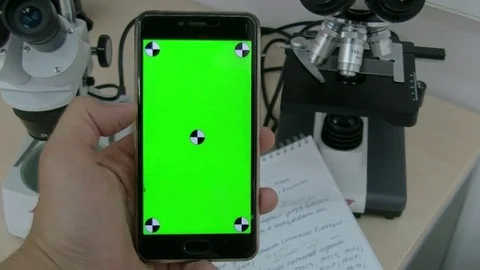 Close-up of male hands using smartphone outdoors in the city center. hroma Key Stock Footage 78013145