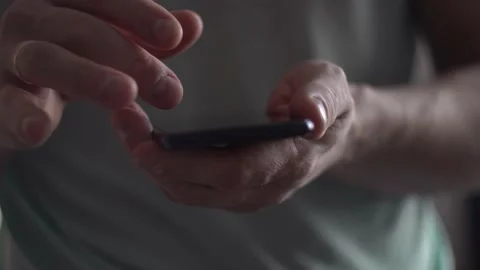 Close-up of male hands using smartphone, selective focus Stock Footage 170485785