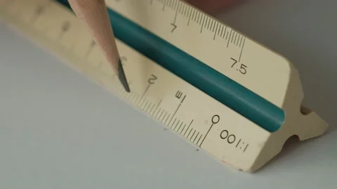 Close up, Male Hands using Triangle Scale Ruler with Wooden Pencil Stock Footage 156042594