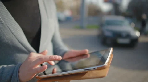 Close-up of male hands which thumb through news in the tablet. Stock Footage 62171495