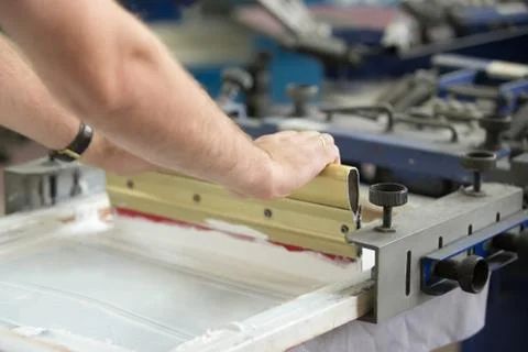 Close-up of male hands working with squeegee Foto stock