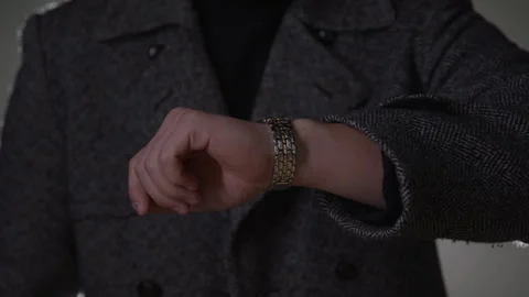 Close-up of Male Model Checking High End Wristwatch During Photo Shoot in Stock Footage 270300499