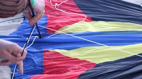 Close up of Male Preparing Kite for Flight Stock Footage 51346588