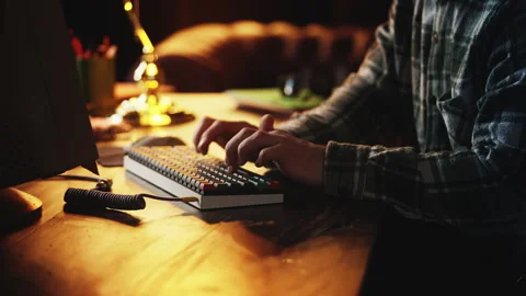 Close-up of male programmer working on retro computer and typing on keyboard Stock Footage 321072162
