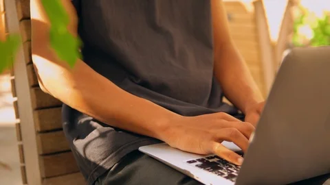 Close up male working using laptop outdoors Stock Footage 112972004
