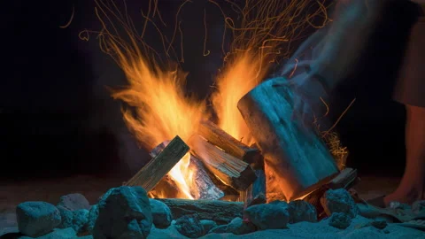 Close up Man Adding Logs Bonfire Ocean Sandy Beach Night Timelapse 8k Stock Footage 182621928