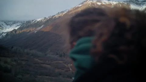 Close-Up of Man Adjusting Camera Settings Before Photographing Mountains Video stock 302220581