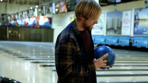 Close up of man aiming while bowling Video stock 305141759