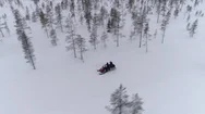 Close Up: Man And Woman Riding Snowmobile On Forested Mountain Slope In Norway Stock Footage