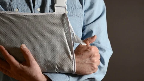 Close Up Of Man With Arm In Sling Stock Footage 75832580