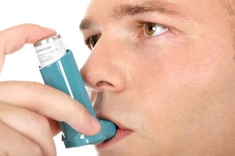 Close up of a man with asthma pump Stock Photos