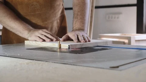 Close-up. A man with a beard works in his workshop. Profession carpenter. A man Stock Footage 113994209