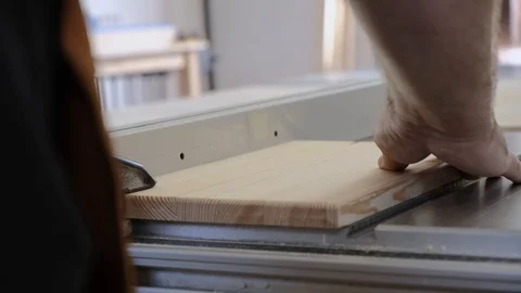 Close-up. A man with a beard works in his workshop. Profession carpenter. A man Stock Footage 113994417