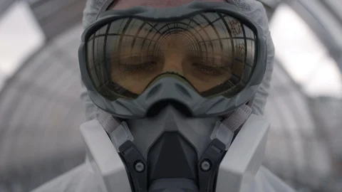 Close-up of a man in a bio-protective suit Video stock 129332562
